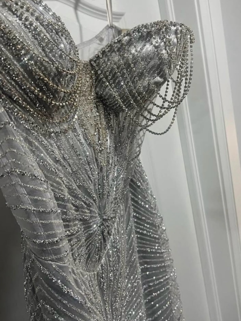 Strapless Silver Beaded Prom Dress with Draped Chain Accents